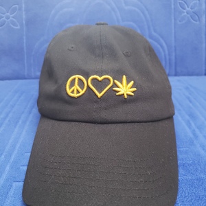 Black baseball hat  with symbols is being swapped online for free