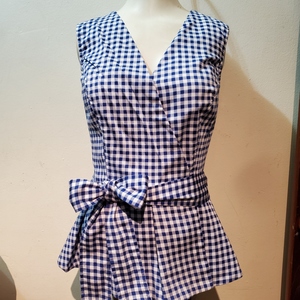 Checkered Sleeveless peplum Sz. S  is being swapped online for free