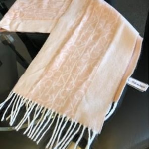 Pink Blush White Calvin Klein monogram scarf is being swapped online for free