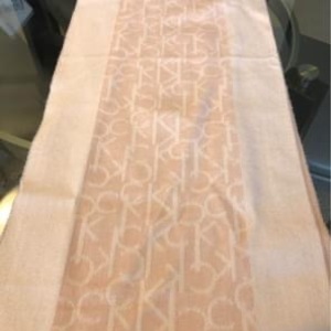 Pink Blush White Calvin Klein monogram scarf is being swapped online for free