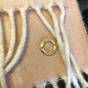 Pink Blush White Calvin Klein monogram scarf is being swapped online for free