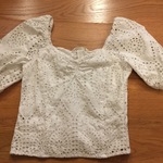 White Eyelet Peasant Style Top is being swapped online for free
