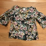 Floral bell sleeve top  is being swapped online for free