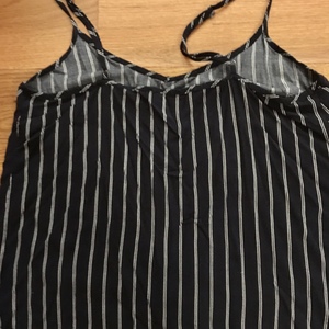 Light Navy & White Stripped Tank  is being swapped online for free