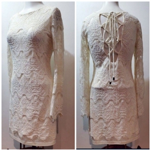 Long Sleeve Corchet Back Lace Dress Sz Small is being swapped online for free
