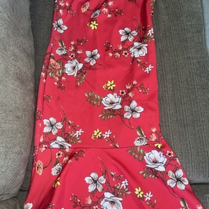 Red flowaral dress sleevless flarred bottom mermaid styled is being swapped online for free