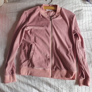 Juicy Immitation velvet pink tracksuit jacket is being swapped online for free
