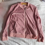 Juicy Immitation velvet pink tracksuit jacket is being swapped online for free
