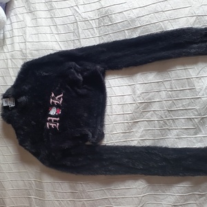 Hello kitty Faux Fur BERSHKA crop sweater is being swapped online for free