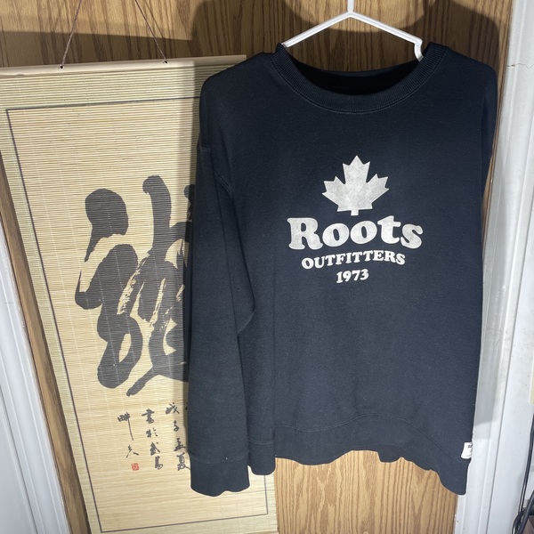 Black vintage roots sweater is being swapped online for free