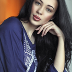 Amber Miller is swapping clothes online from London, United Kingdom